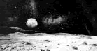 La tierra suspendida en el espacio sideral vista desde la luna